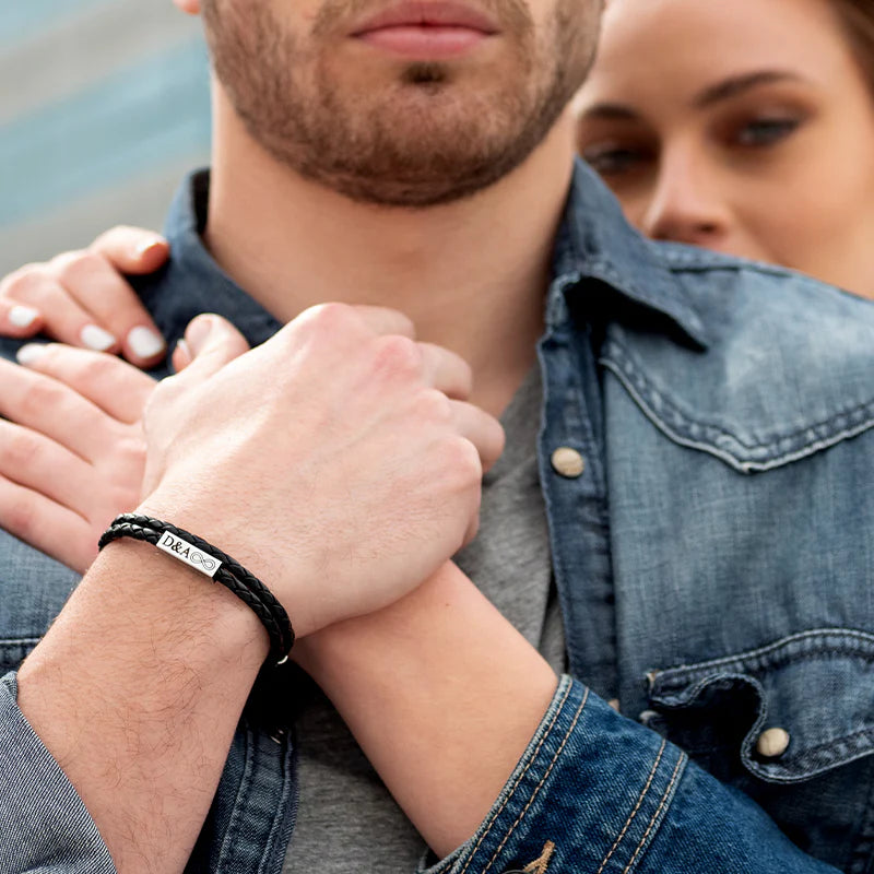 Black double wrap woven leather bracelet features a signature SAAR lobster clasp with stainless steel engraving plate for personalisation