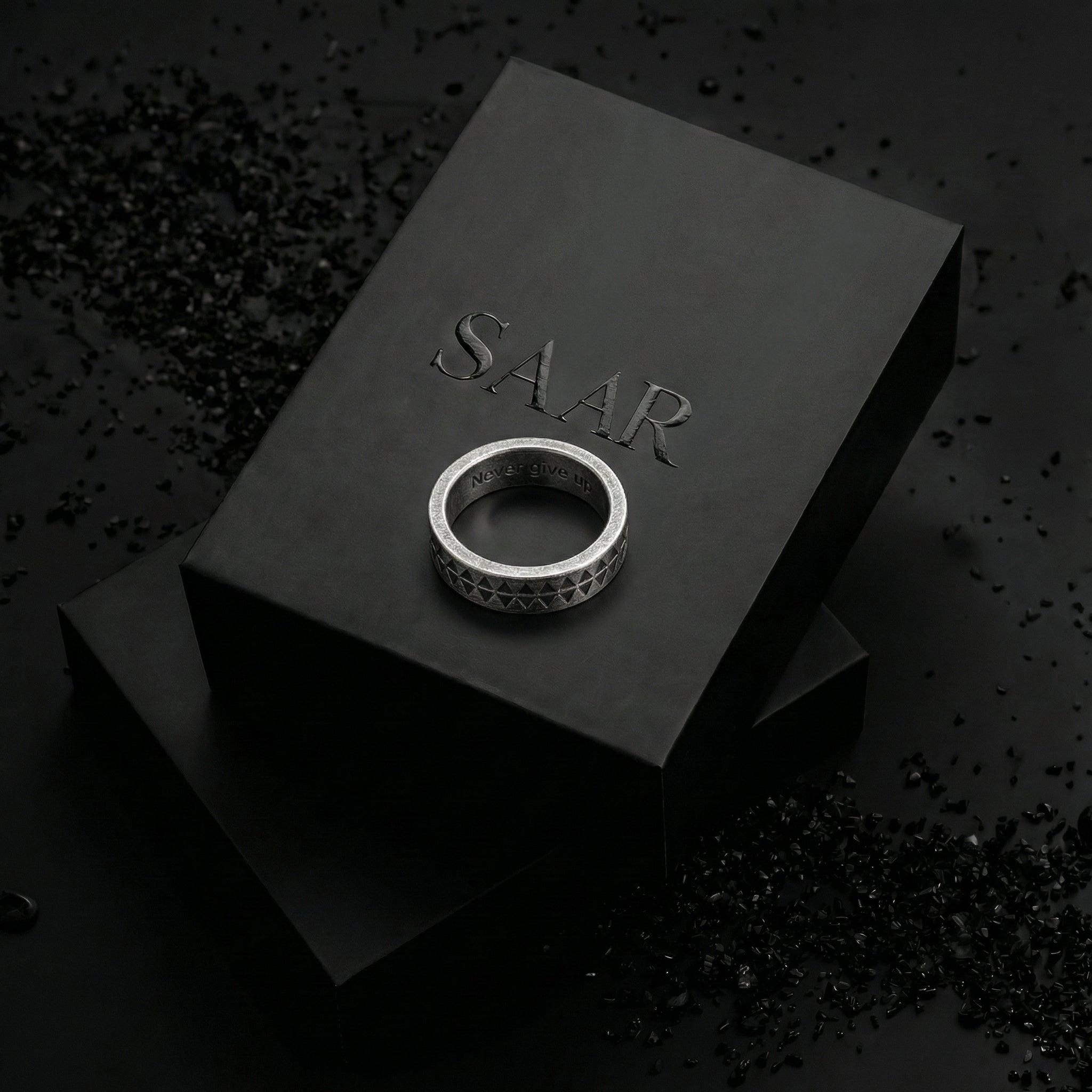 Double triangle design ring with inside engraving "Never give up".