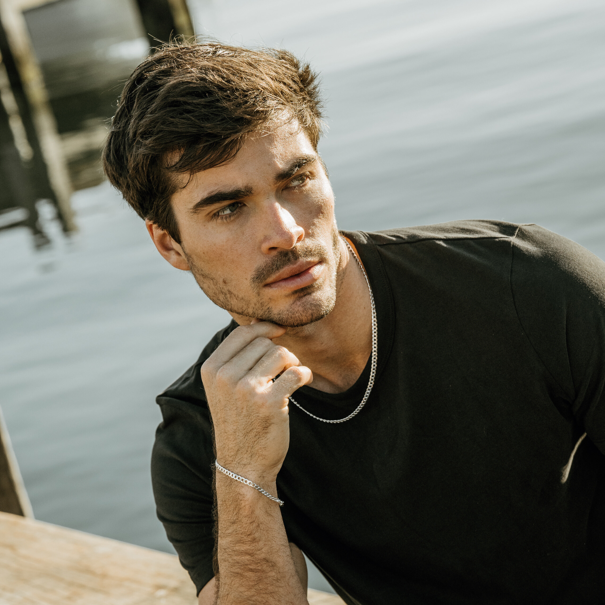 A male wearing SAAR CO's 925 Sterling Silver Nathan Set Necklace and Bracelet.