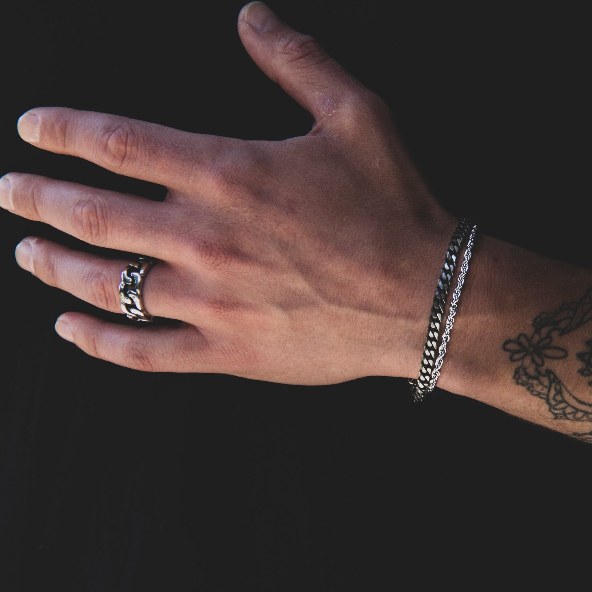Stainless Steel Diamond cut rope chain bracelet and 5mm Cuban chain bracelet.