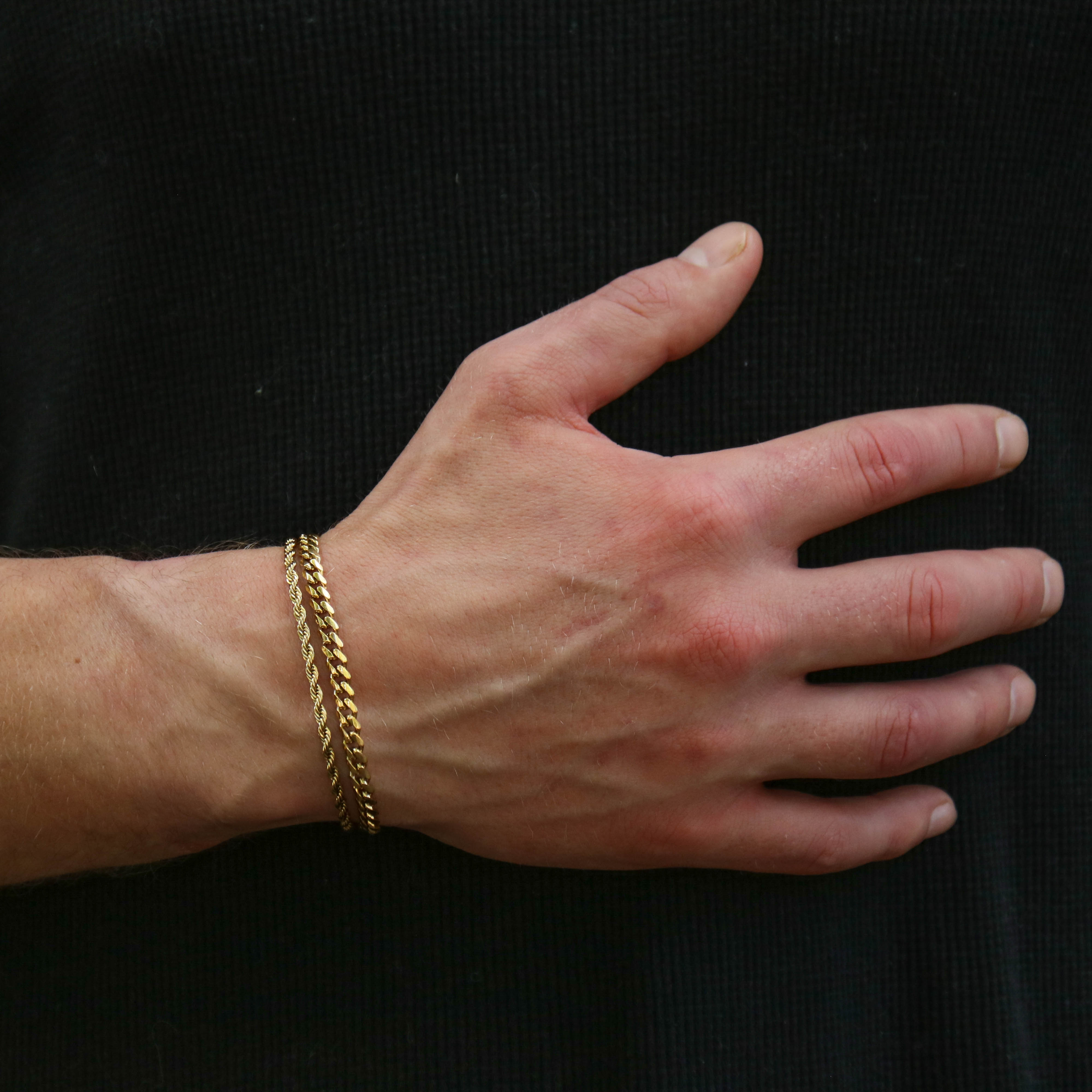 18 K Gold Plated Diamond cut rope chain bracelet and 5mm Cuban chain bracelet.