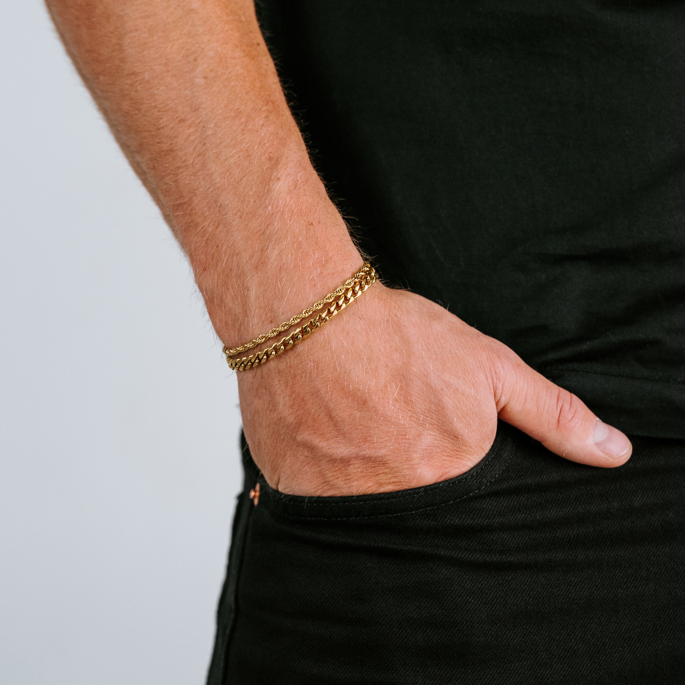 18 K Gold Plated Diamond cut rope chain bracelet and 5mm Cuban chain bracelet.