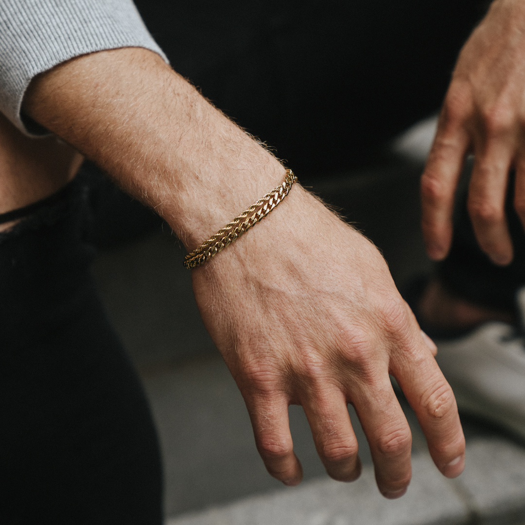 18 K Gold Plated Diamond cut rope chain bracelet and 5mm Cuban chain bracelet.