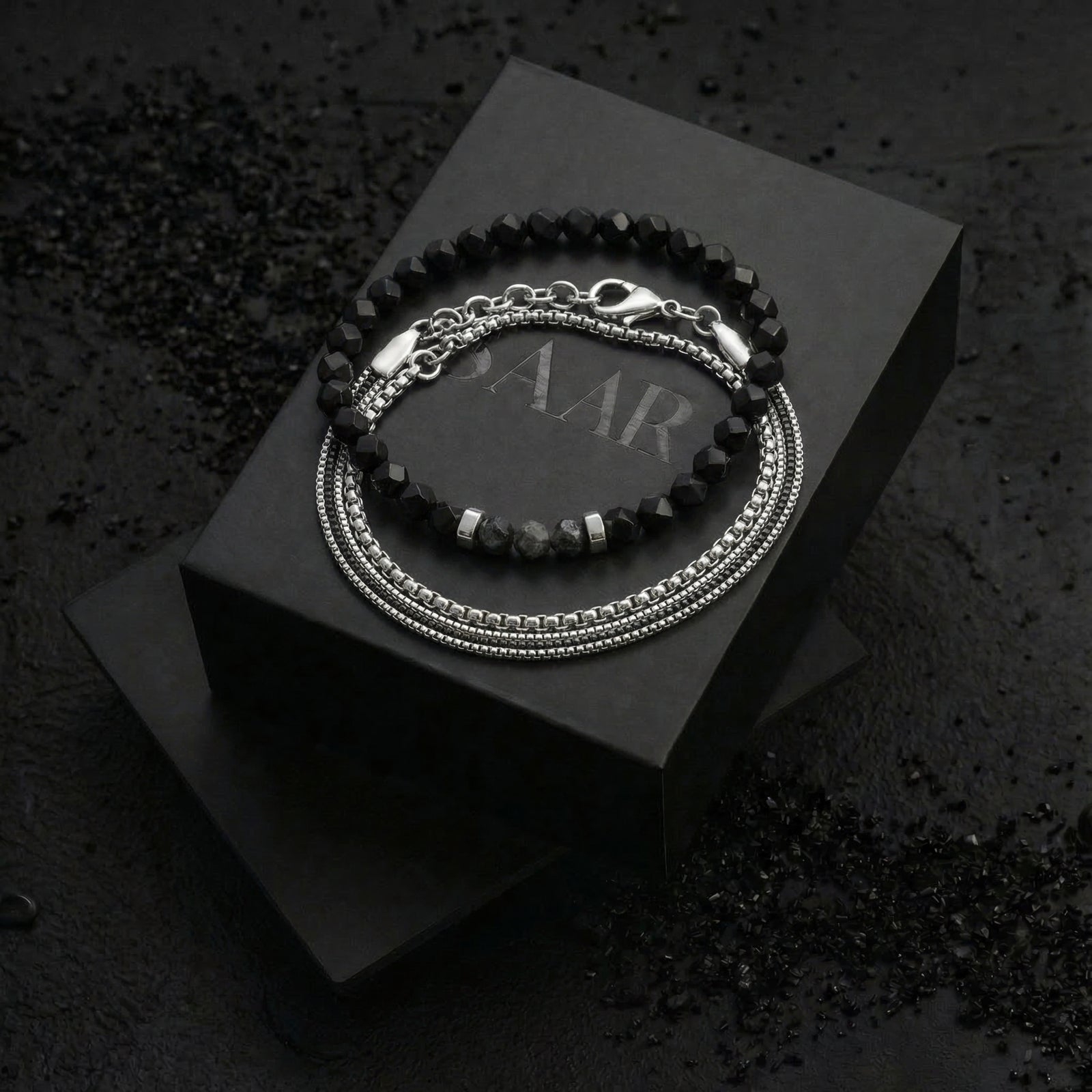 1 Stainless steel layered bracelet with a lobster clasp and 1 6mm diamond cut black Onyx gemstones elastic bracelet 